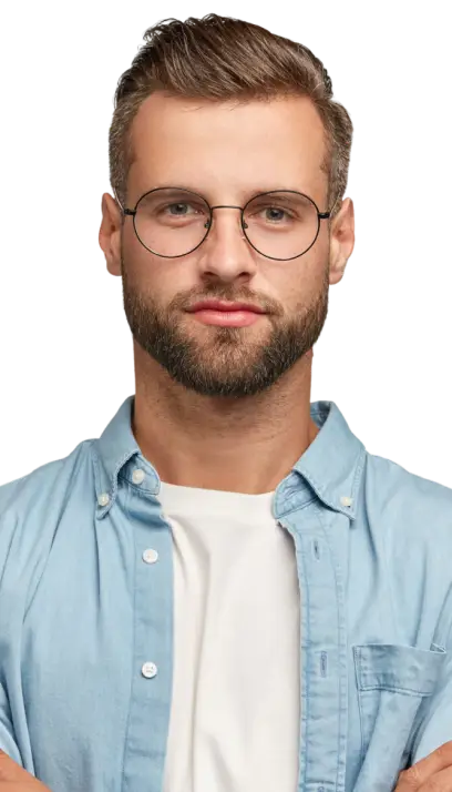 A man wearing glasses and sporting a beard, looking thoughtfully into the distance.