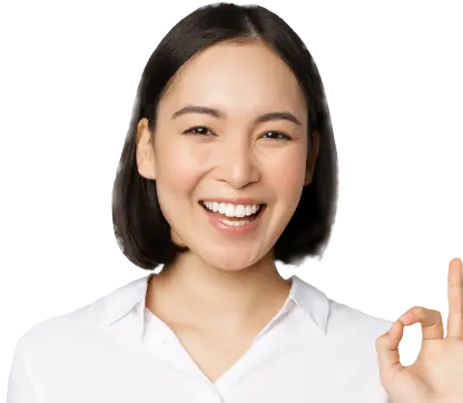 A woman smiling and making an "OK" sign with her fingers, conveying positivity and assurance.